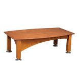 A Mid Century teak coffee table on chromed feet. 113.5x62x36cm