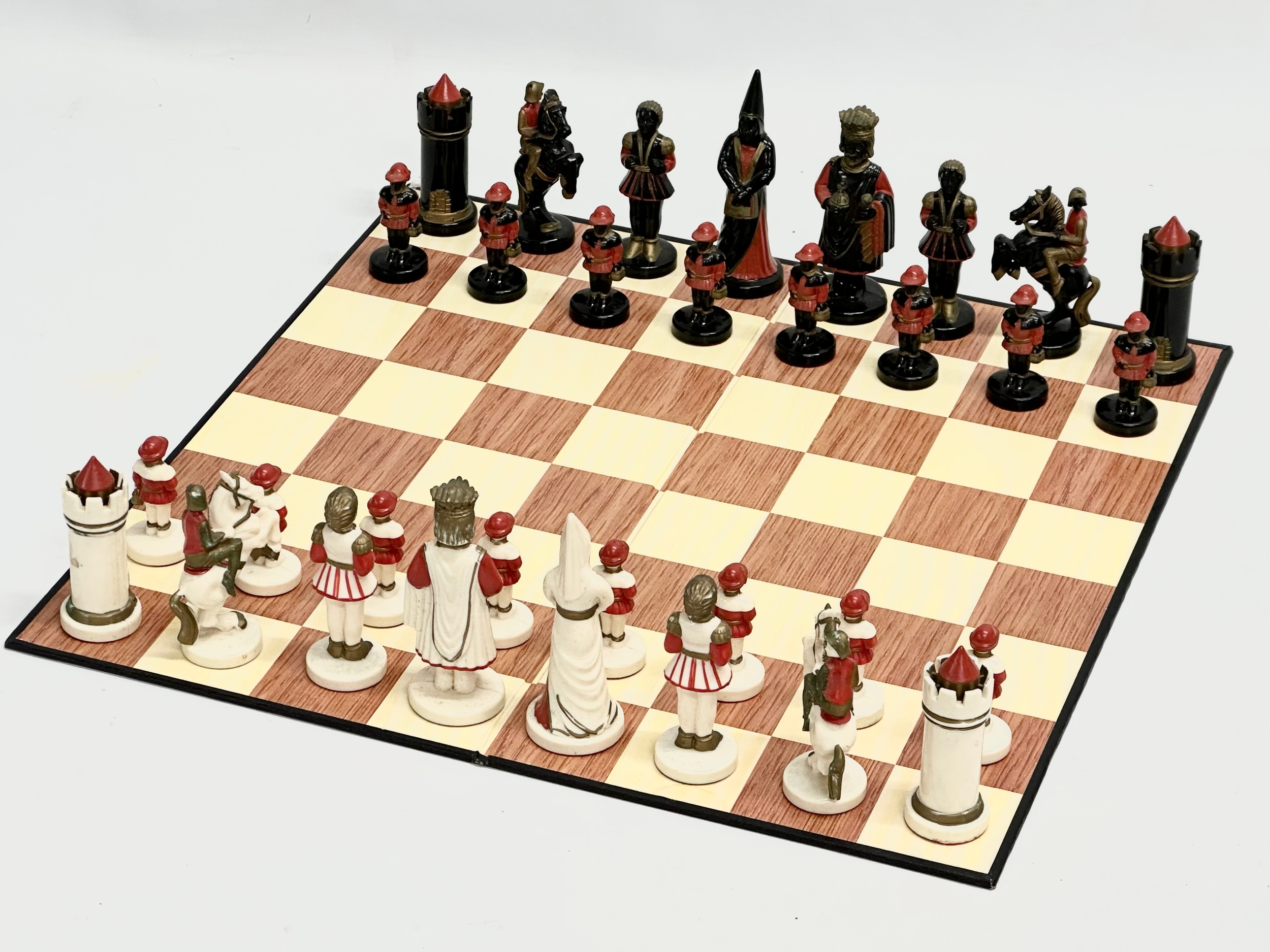 A medieval style chess set. 38x38cm