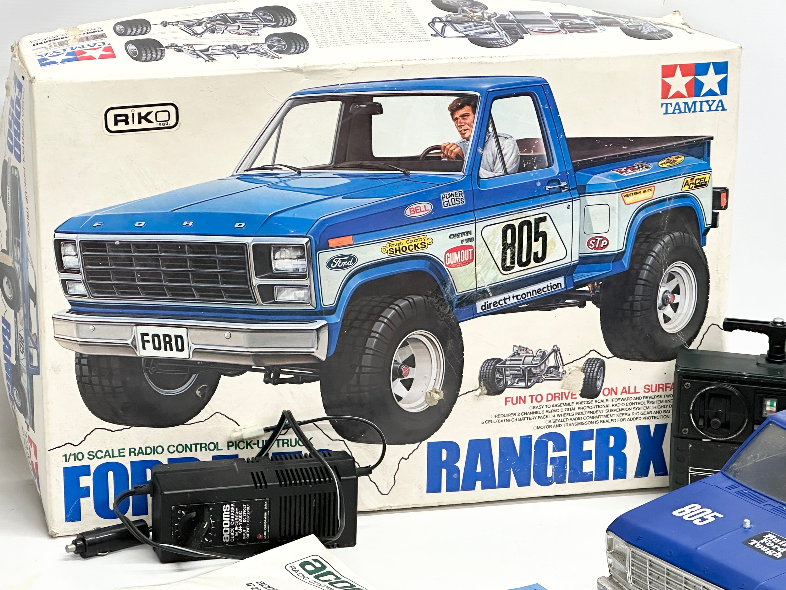 A Tamiya Riko Ford F 150 Ranger XLT radio control pick up truck with box. 1/10 scale. Remote and - Image 6 of 6
