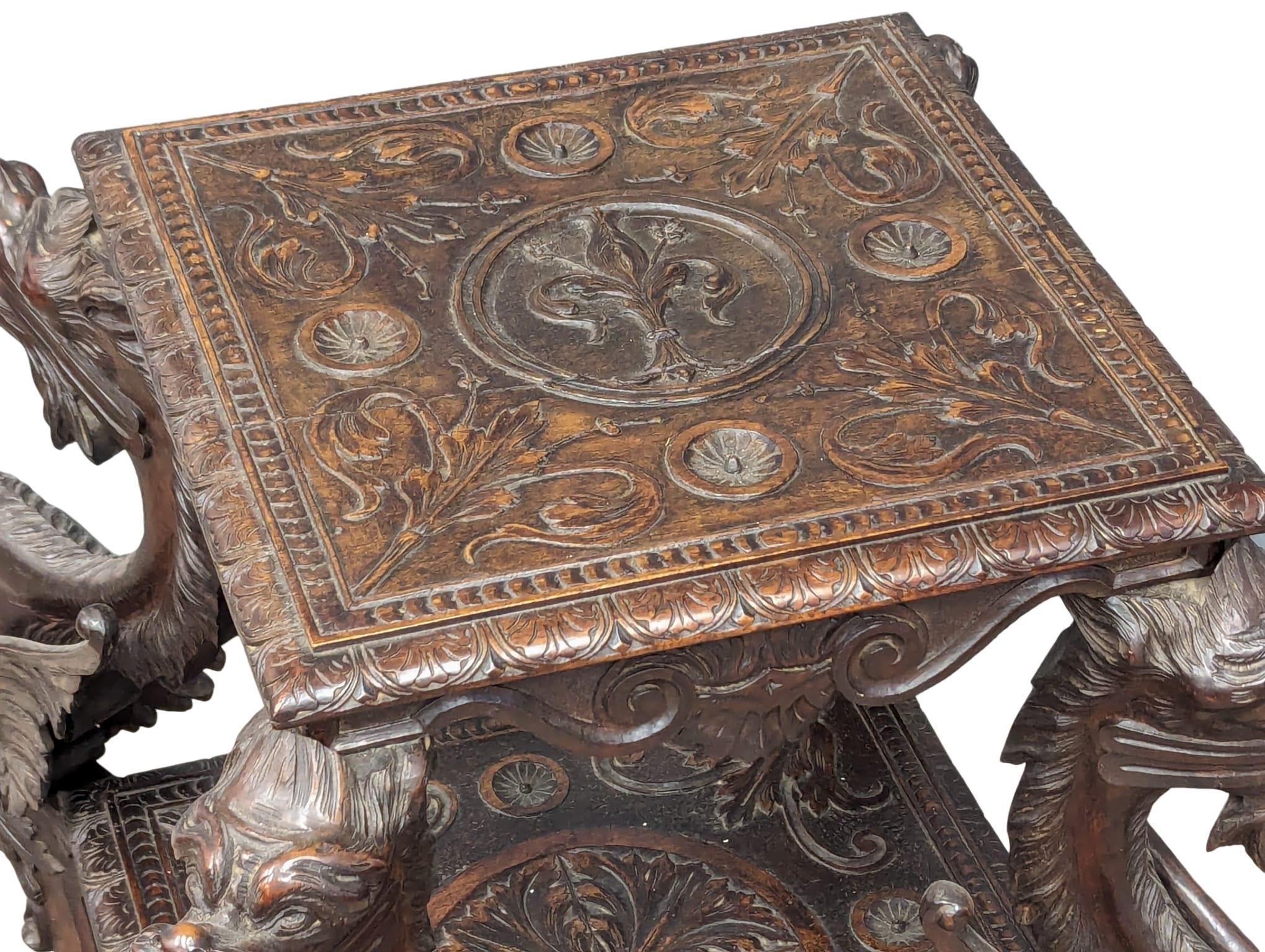 A large Late 19th Century Italian carved walnut 2 tiered table with 4 carved griffin figures.66x73. - Bild 5 aus 7