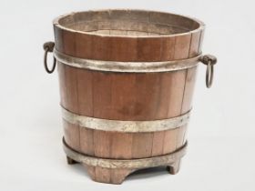 A large Late 19th Century oak coal bucket with large drop ring handles. Circa 1880-1900. 53x45x43.