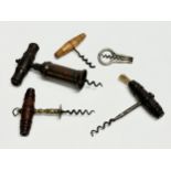 A good collection of 19th Century corkscrews with turned handles. A large barrel shaped corkscrew