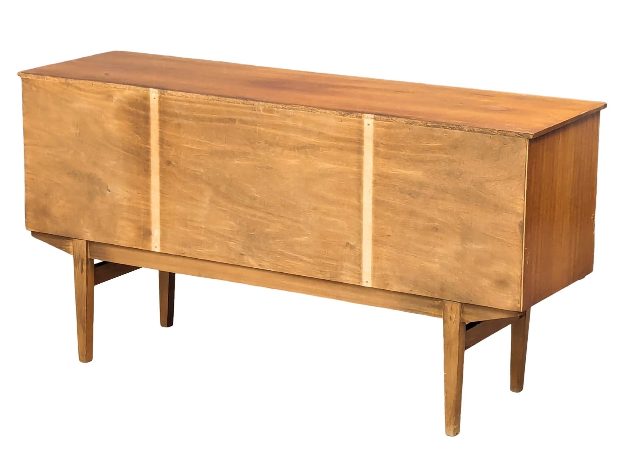 A mid century teak sideboard, 133cm x 39.5cm x 69cm - Image 7 of 10