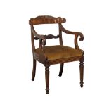 A George IV mahogany armchair with scroll arms, circa 1820s