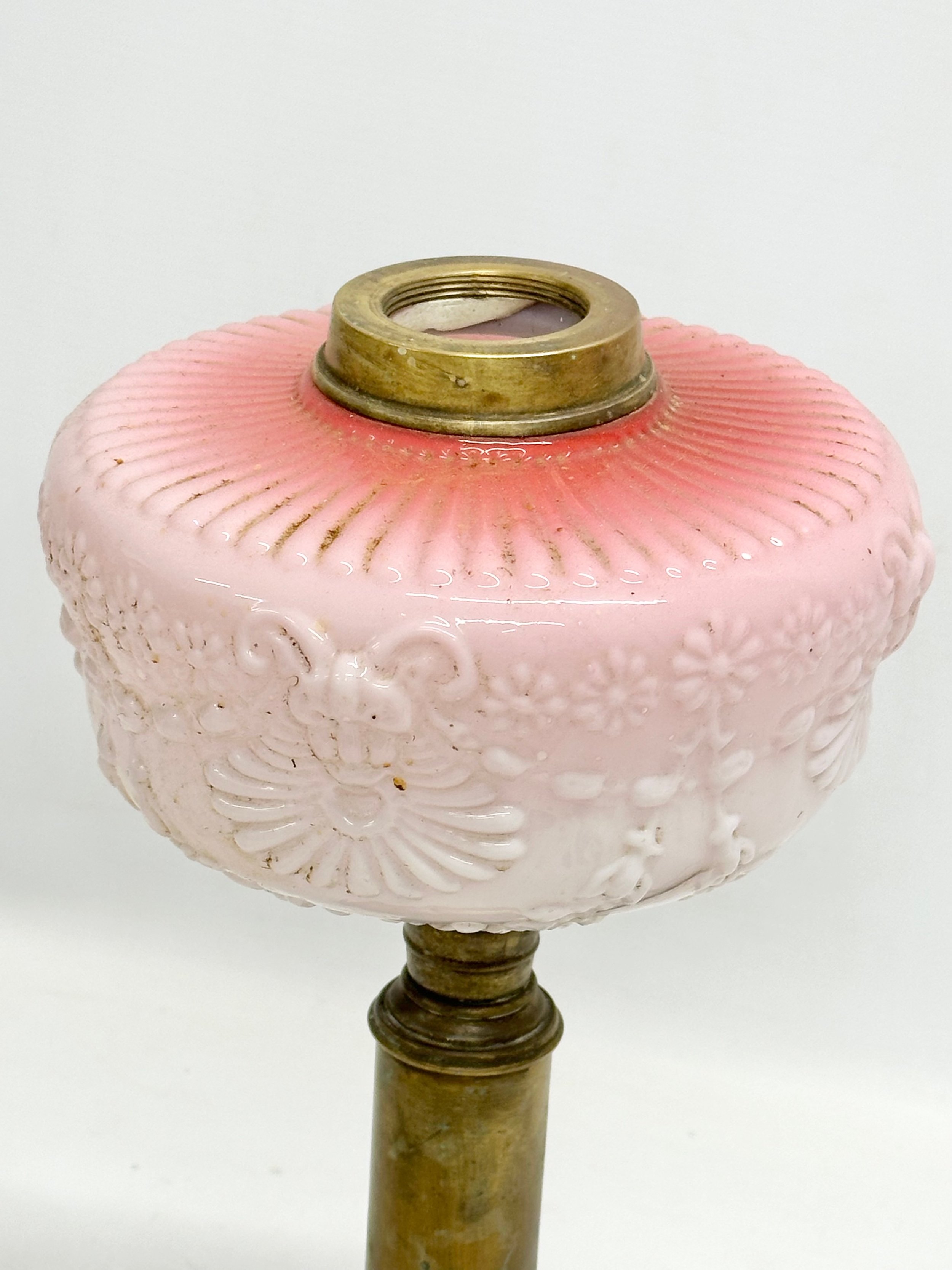 A Victorian embossed milk glass oil lamp with brass column. 35cm - Image 2 of 3