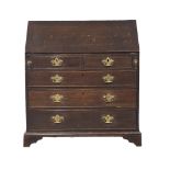 A George III oak writing bureau. Circa 1760-1780. 94x55x106cm