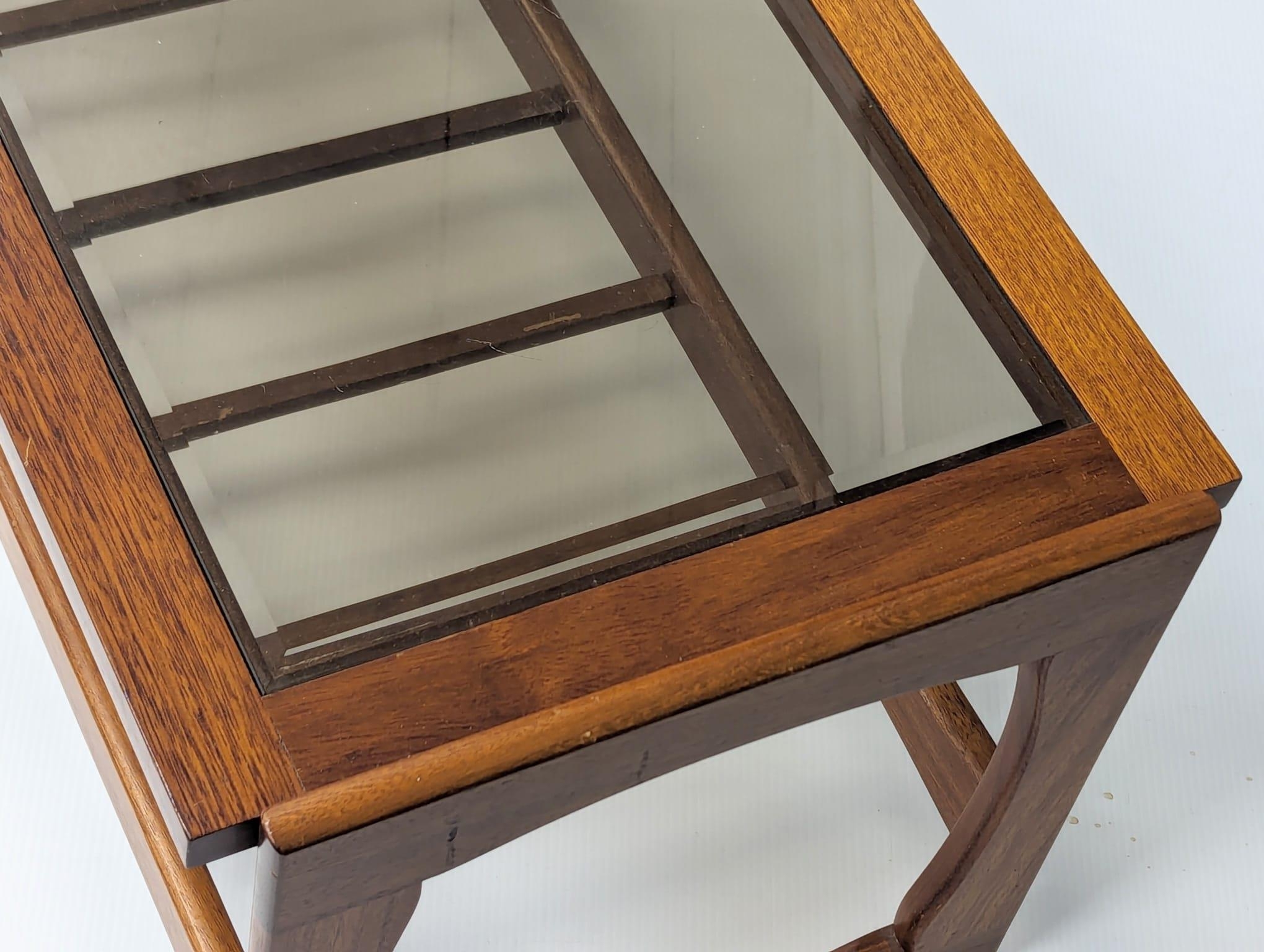 A Mid Century teak and glass top coffee table. 106.5x47.5x43cm - Image 6 of 6