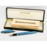 A 14k gold nip fountain pen by Sheaffer’s.