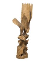 A large carved wooden eagle. 119cm