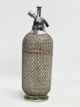 A 1930’s wire mesh soda syphon’s. 35cm