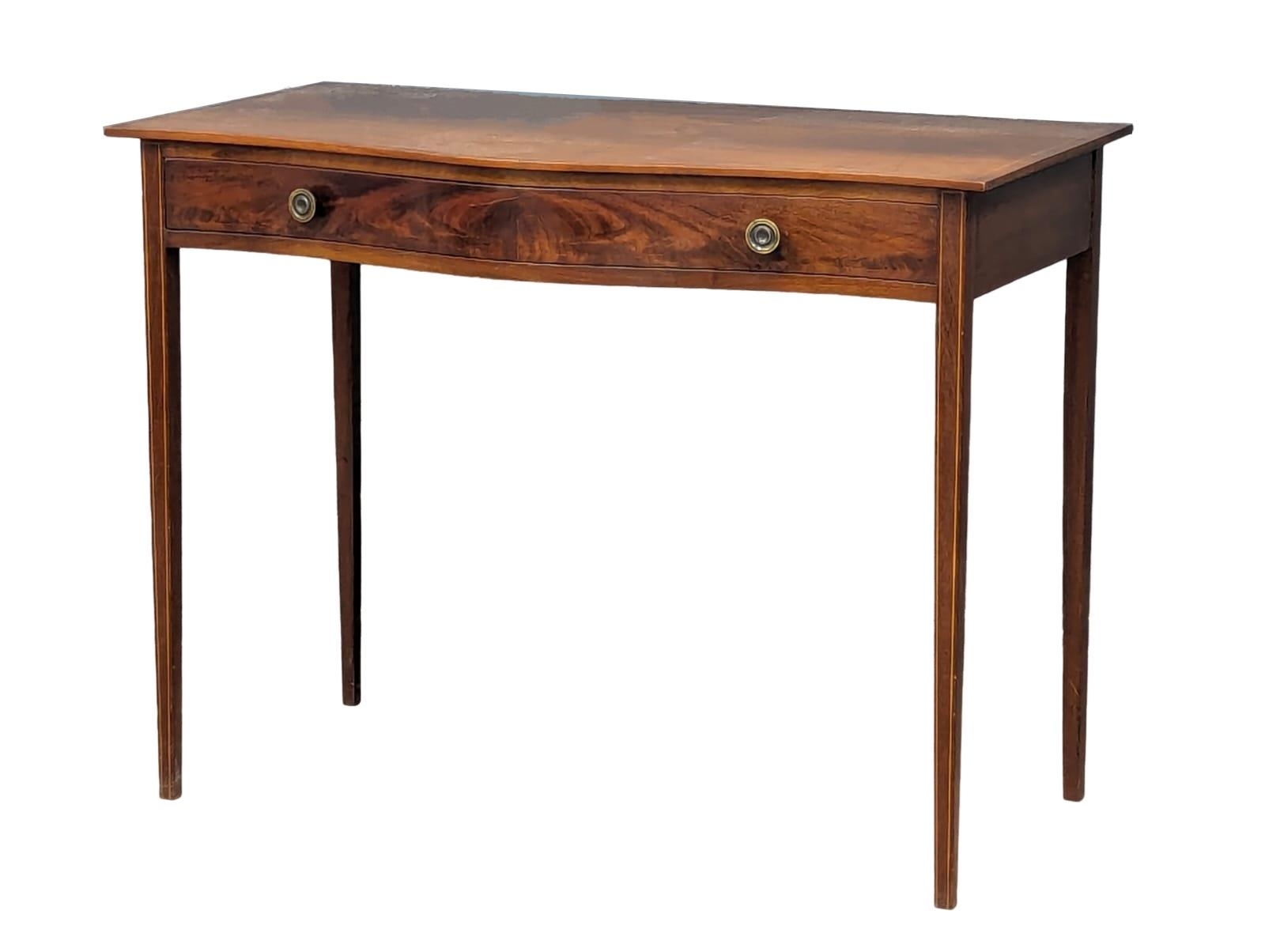 An Early 20th Century Sheraton Revival inlaid mahogany side table on square tapering legs and