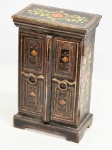 A vintage hand painted tabletop cabinet. 20x11x33cm
