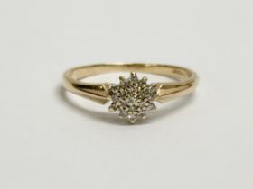 A 9ct gold and diamond ring. 2 grams. Size Q.