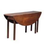 A Georgian mahogany wake table. Circa 1800. Closed, 152x39x72cm. Extended, 152x107x72cm