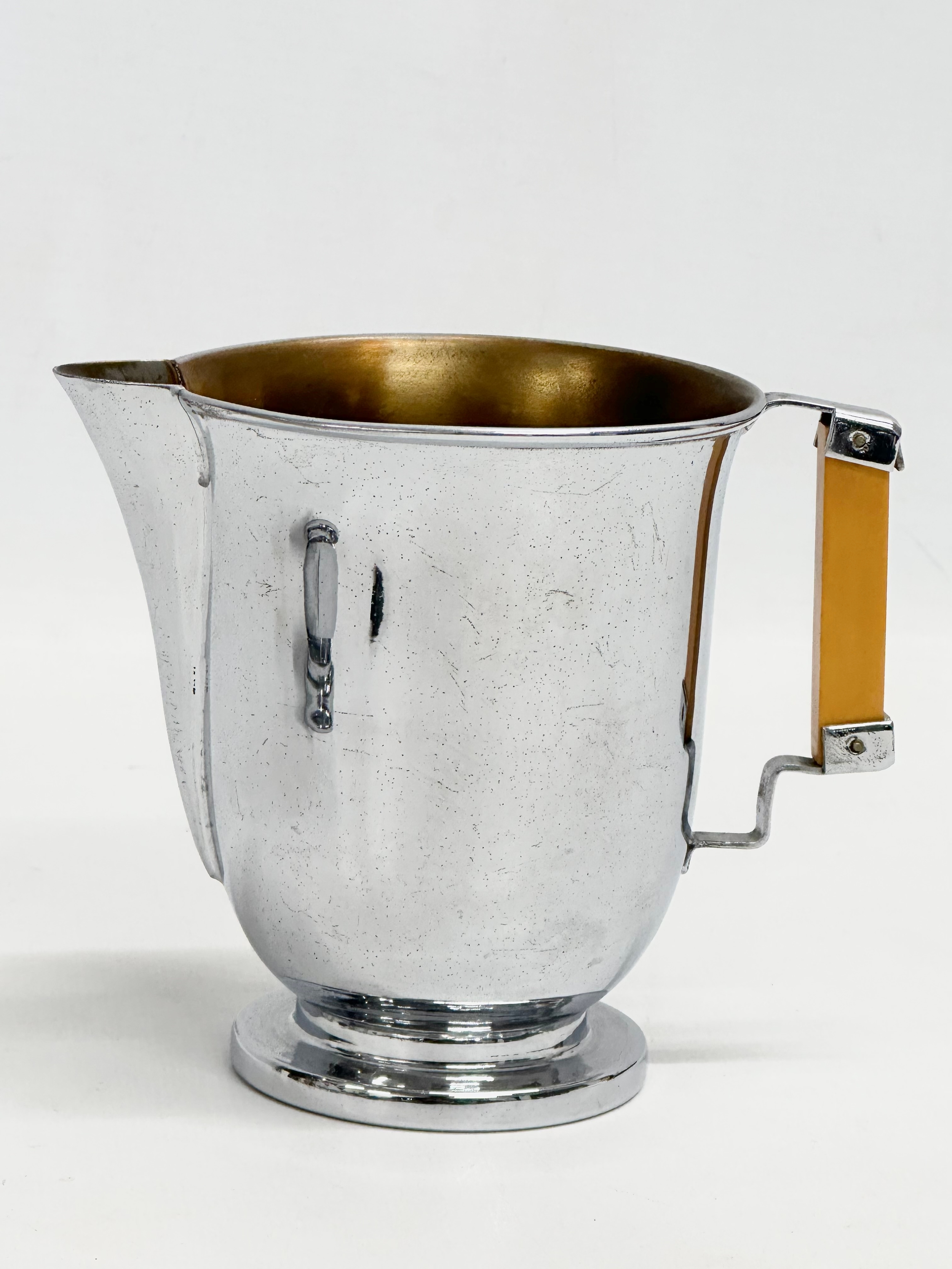 An Art Deco chromium plated sugar bowl and matching milk jug. - Image 2 of 4