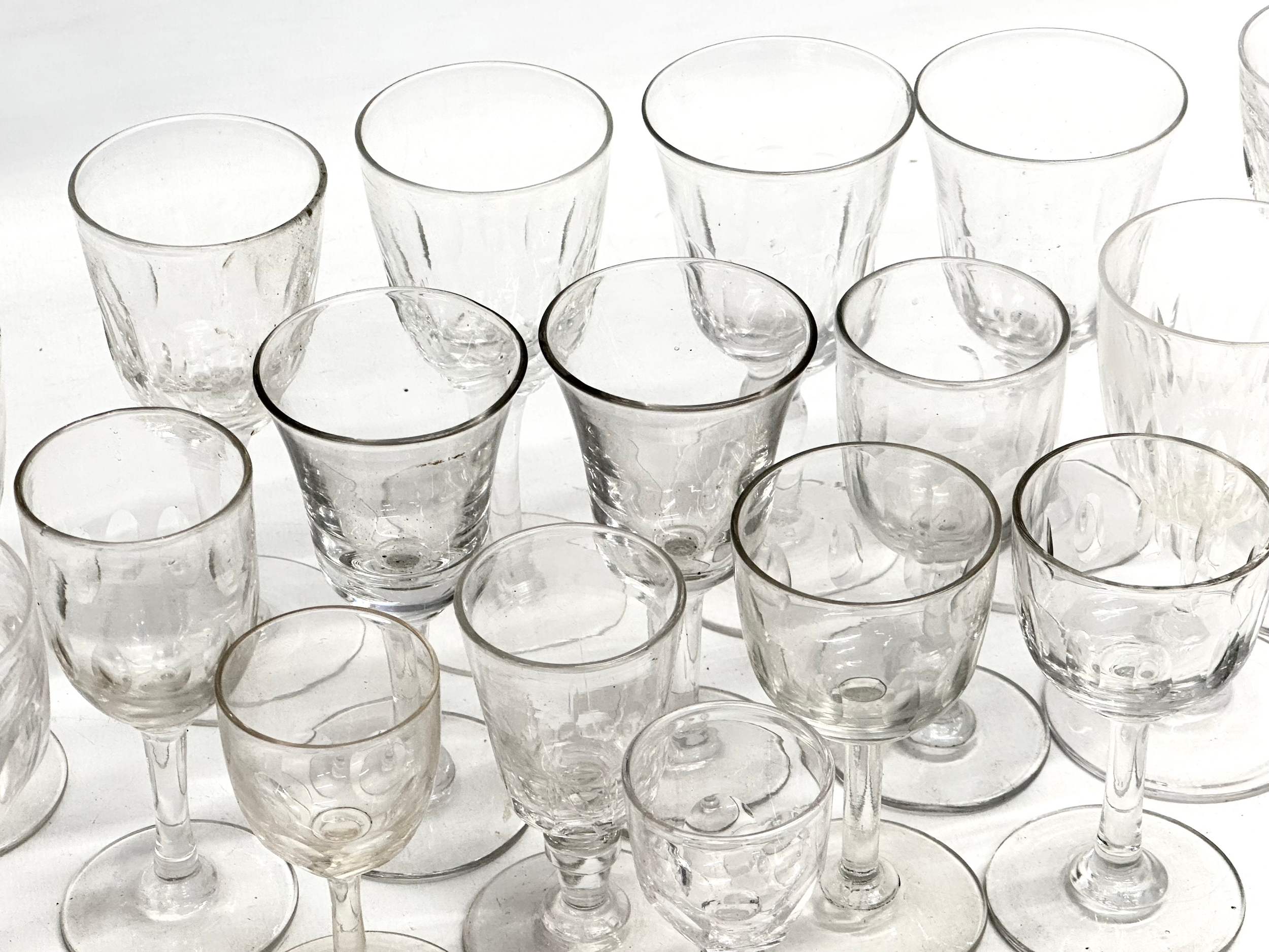 A collection of Mid/Late 19th Century Victorian slice lens cut drinking glasses. 13cm. 12cm. 11cm. - Image 6 of 9
