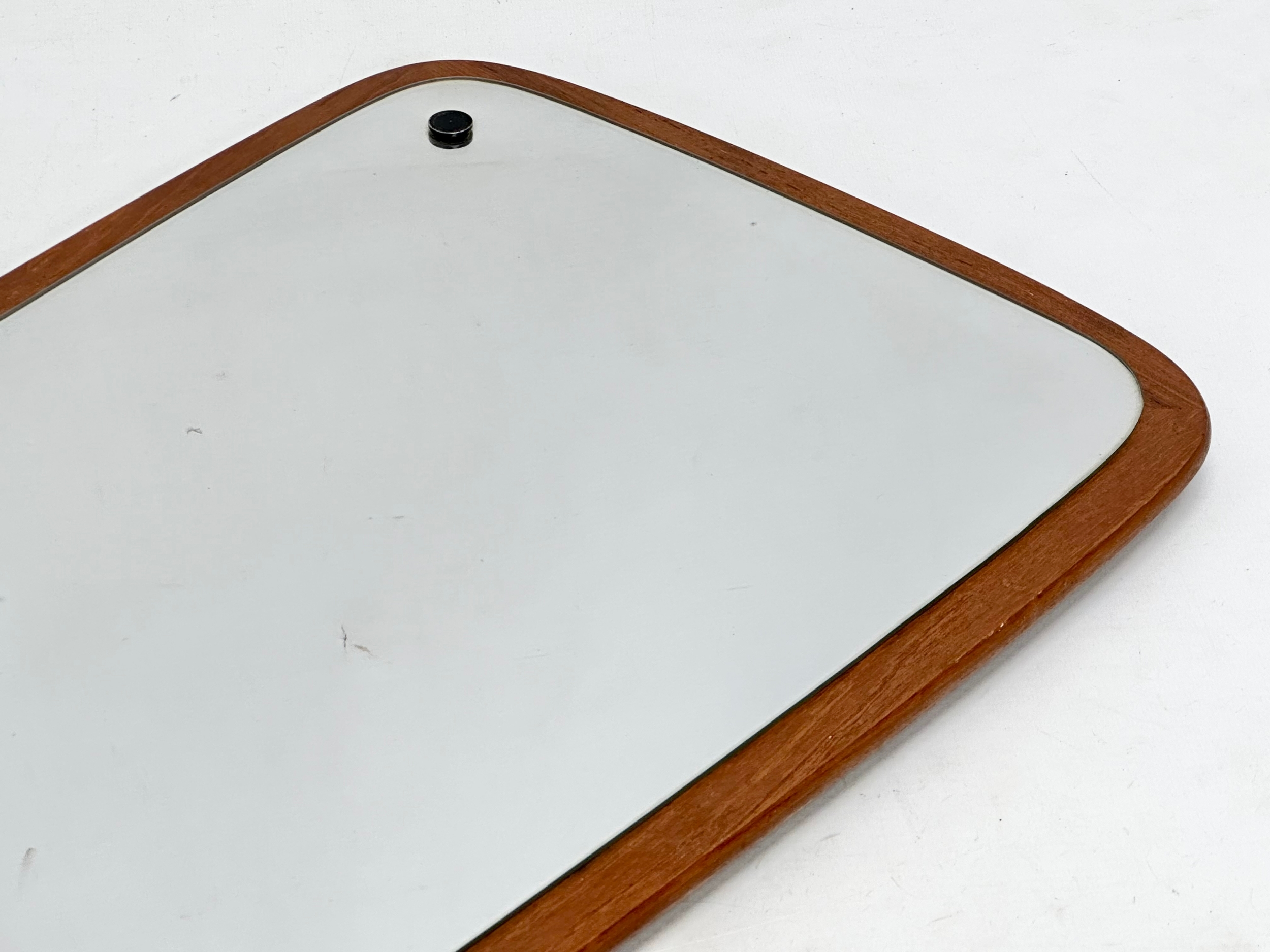 A 1960’s Mid Century teak framed mirror. 34x73cm - Image 2 of 2