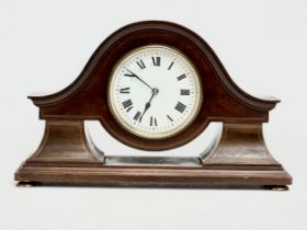 An Edwardian inlaid mahogany mantle clock. 28x9x17cm
