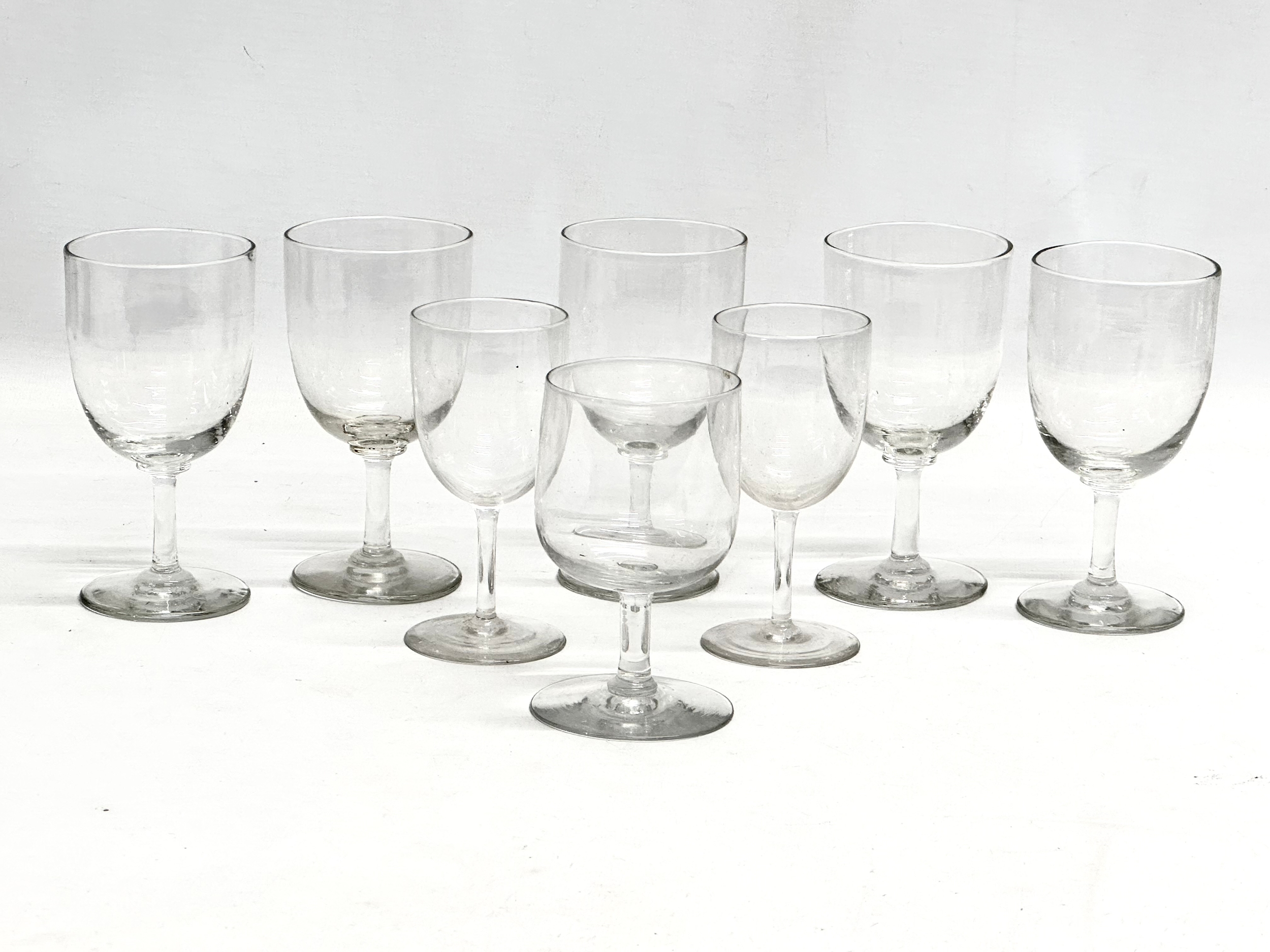8 Mid 19th Century Victorian slim stem rummers and port glasses. 12cm
