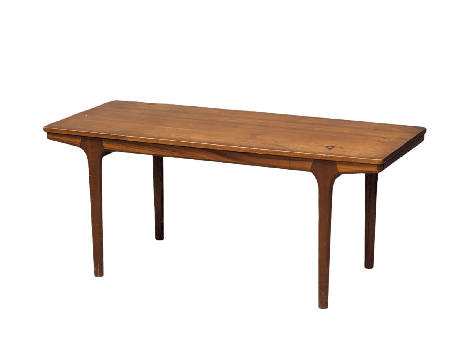A McIntosh Mid Century teak extending coffee table. Extended, 150x48.5x46cm. Not extended 107x48.