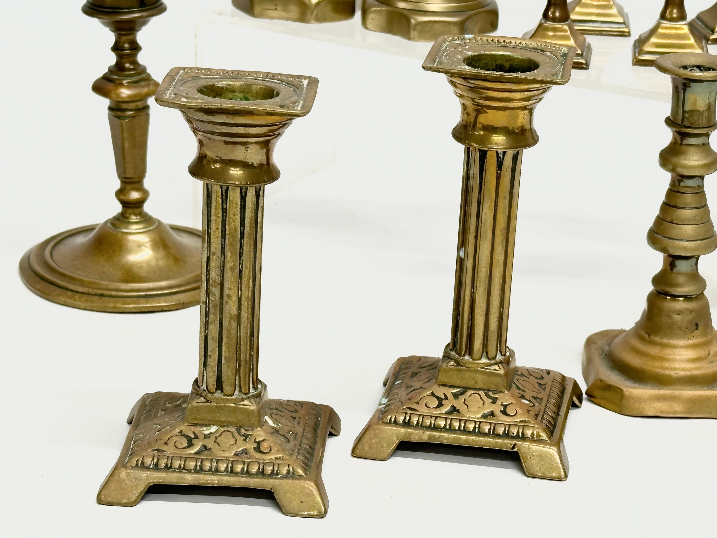 5 sets of Victorian brass candlesticks. 3 pairs and 2 sets of 4. 12cm, 11cm, 11.5. 6cm - Image 3 of 5