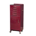 A 1950s dental cabinet on casters, 40cm x 38cm x 100cm