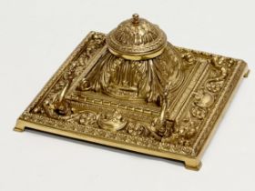 A Late 19th Century Victorian brass inkstand/inkwell with original Bristol Blue liner. 18.5x18.