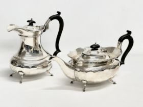 A 2 piece silver tea service. Birmingham 1932. 1500 grams.