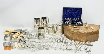 A collection of silver plate. A Walker & Hall oak cutlery box. Walker & Hall silver plated cutlery