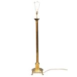 A brass Corinthian style standard lamp. 140cm