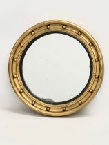 A Mid 19th Century gilt framed mirror. 48cm