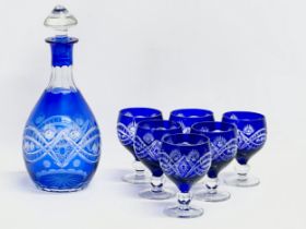 A 7 piece 20th Century Bohemian blue crystal drinks set. Glasses 11cm. Decanter 29cm.