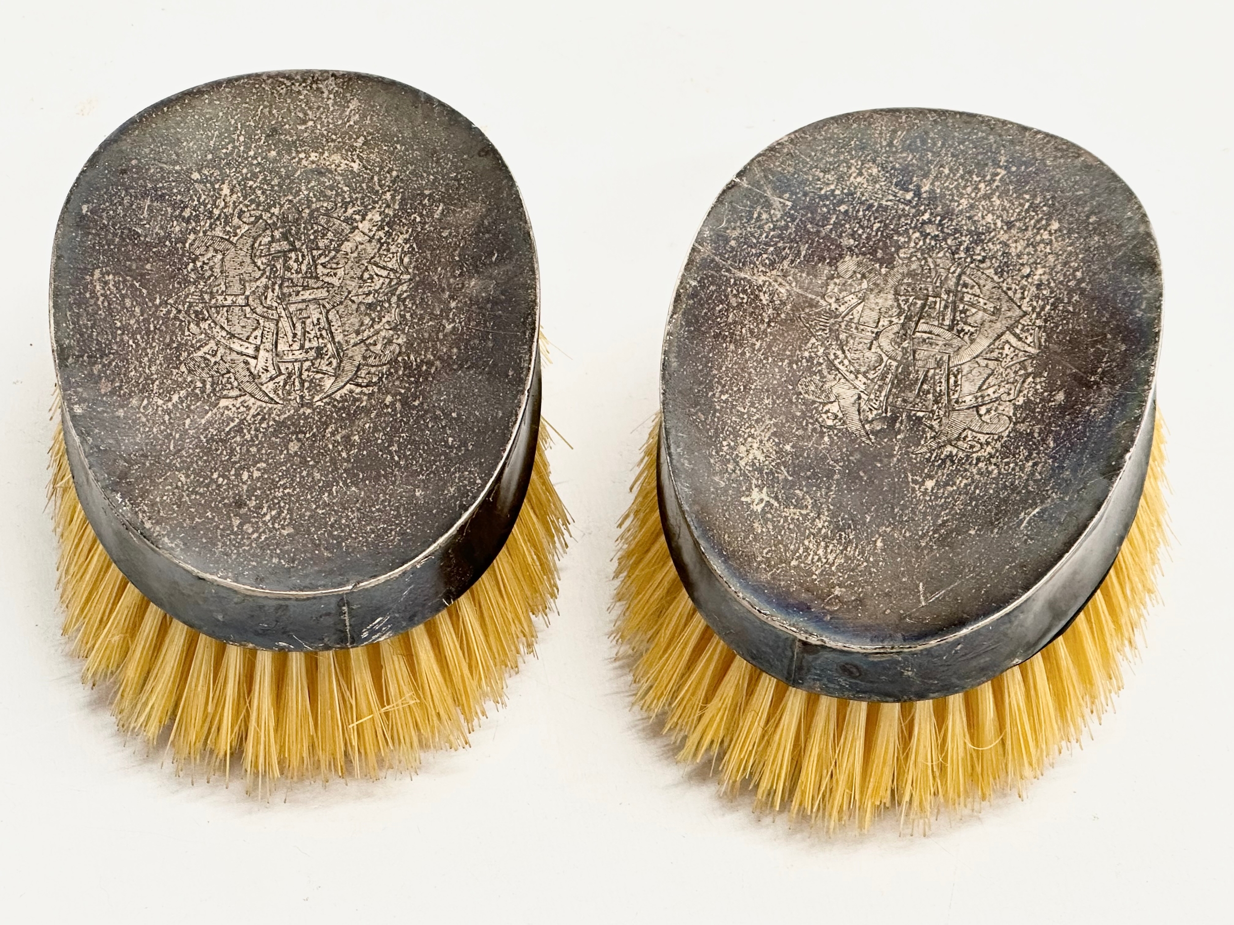 A pair of Late 19th Century Henry Matthews silver backed vanity brushes. Circa 1896. 14x9x6cm - Image 2 of 3