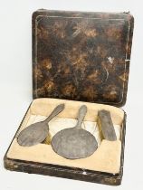 A silver vanity set with case. Birmingham. B&C. Late 19th/Early 20th Century. 31x30x7.5cm