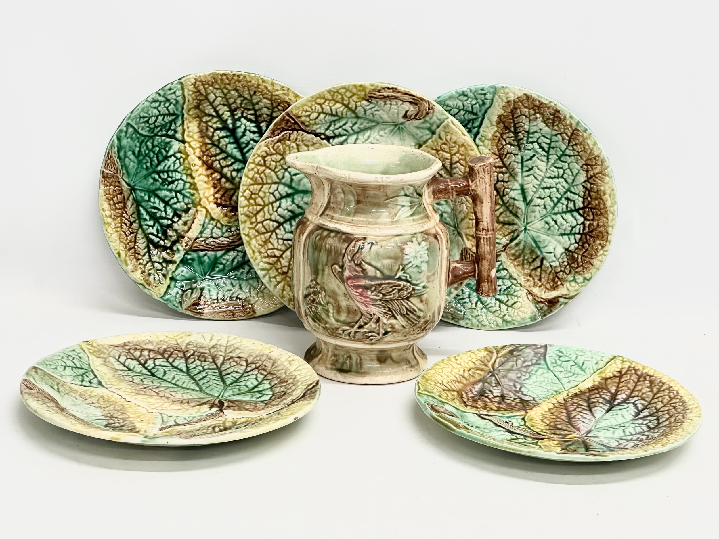 A collection of Late 19th Century Forester Majolica pottery. Plates 21cm. Jug 16x13x17cm