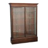 A large Late 19th Century mahogany shop display cabinet with glass shelves. Circa 1890. 157.