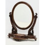 A Victorian mahogany dressing mirror.