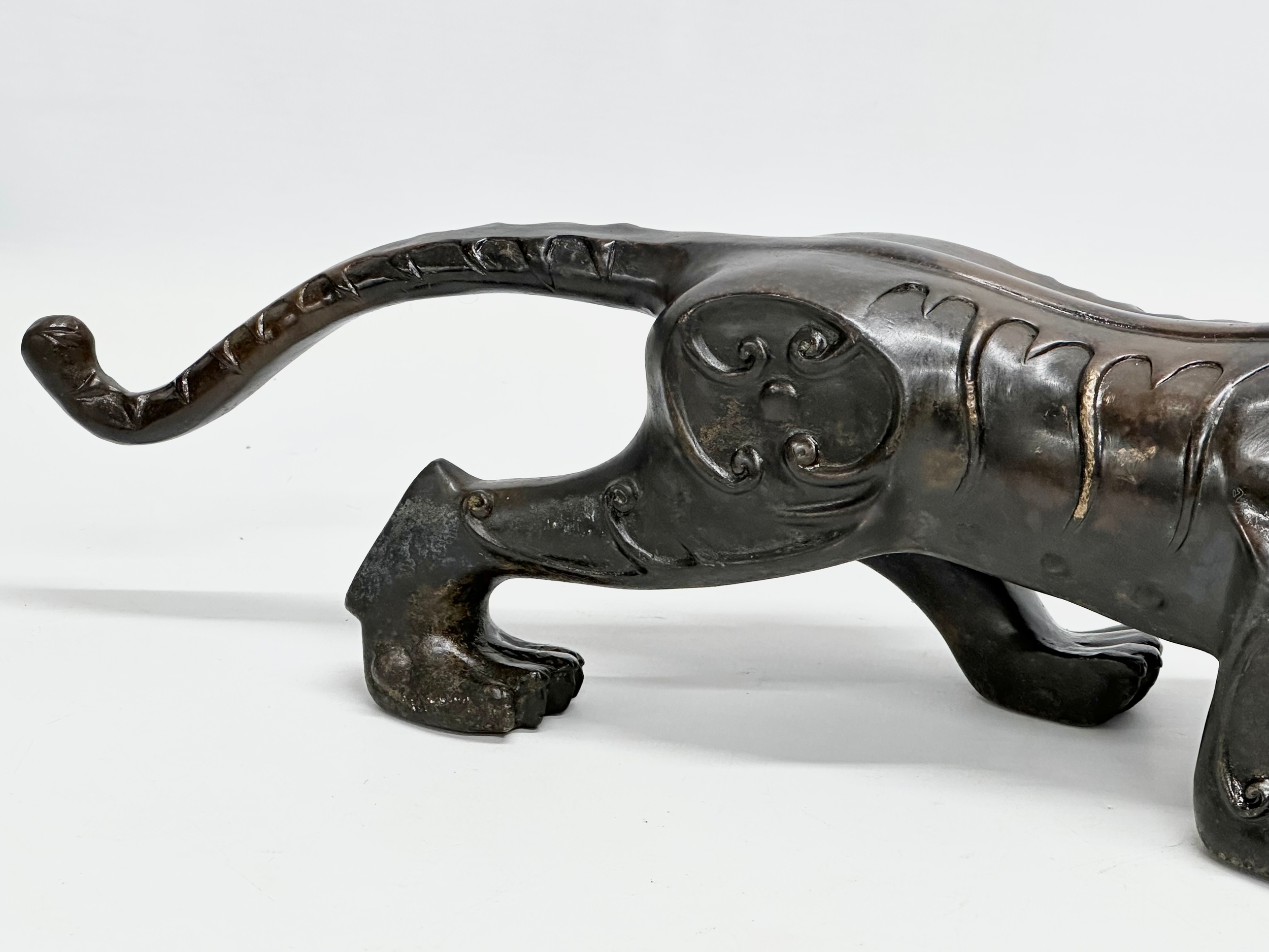 An Early 20th Century Chinese Feng Shui bronze Evil and Wealth Tiger. 38cm - Image 7 of 7