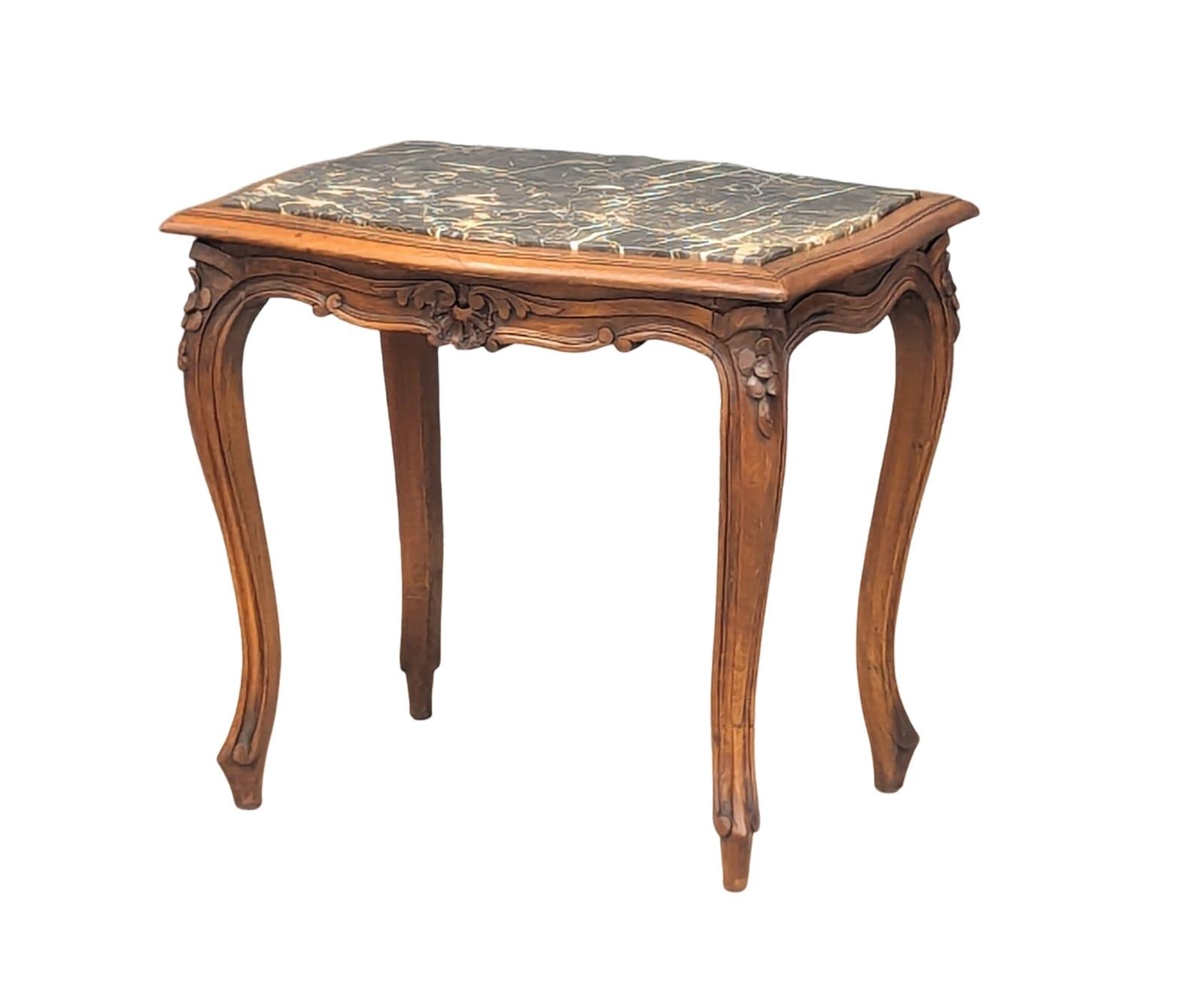 A French Provincial style walnut side table with marble top and cabriole legs, circa 1900. 57cm x