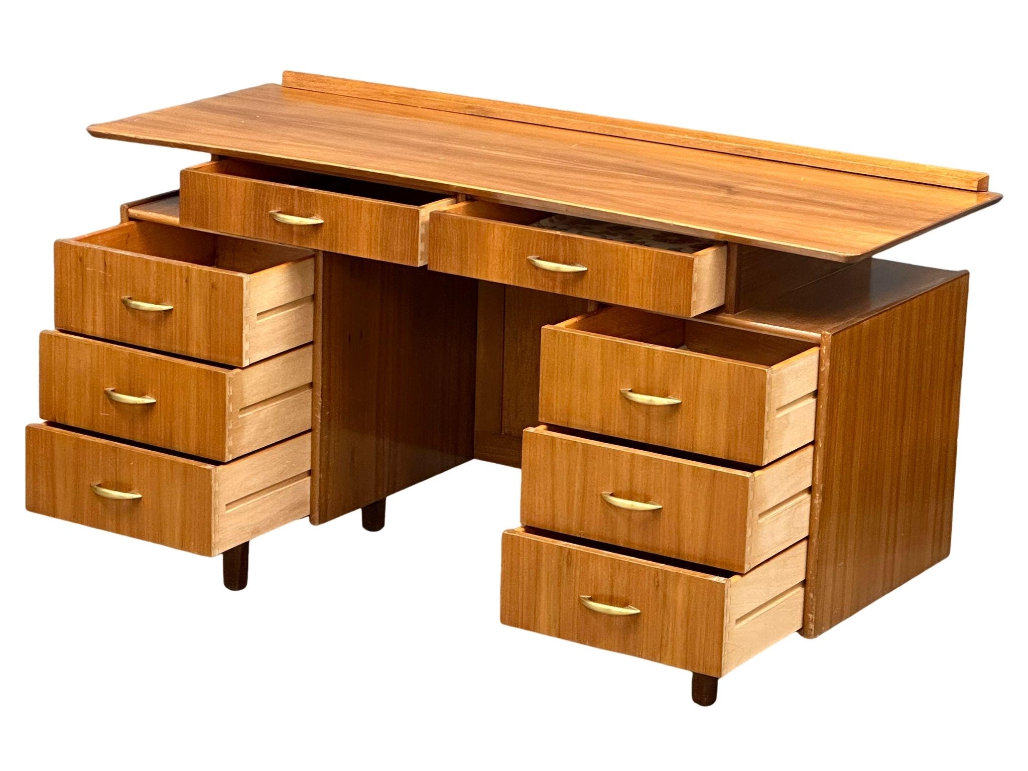 A Mid Century walnut desk/dressing table, 131cm x 49cm x 74.5cm - Image 4 of 5