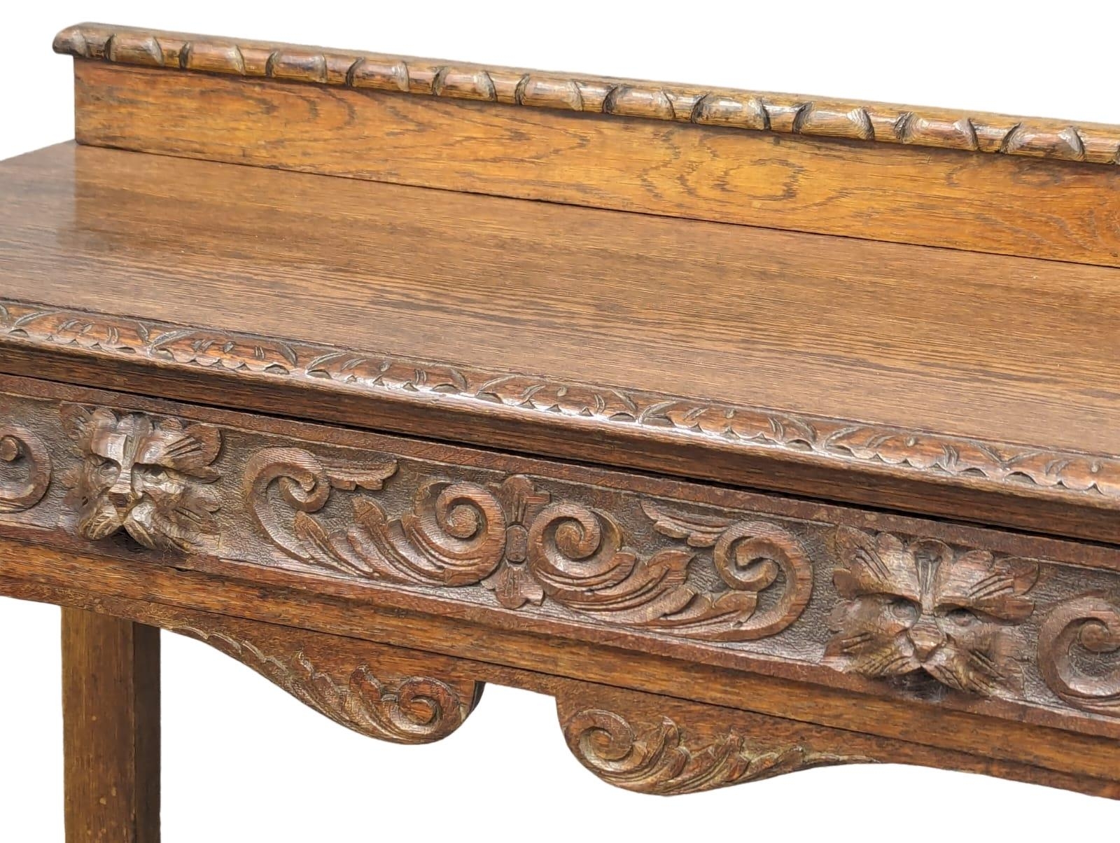 A late Victorian carved oak hall table with bobbin turn legs and Man Of The Forest handles, 107cm - Bild 3 aus 6