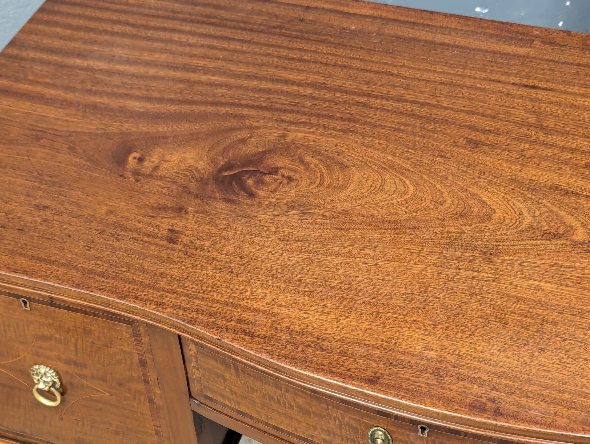 An Early 20th Century Sheraton Revival inlaid mahogany Serpentine front desk / side table. 122x57. - Image 3 of 5