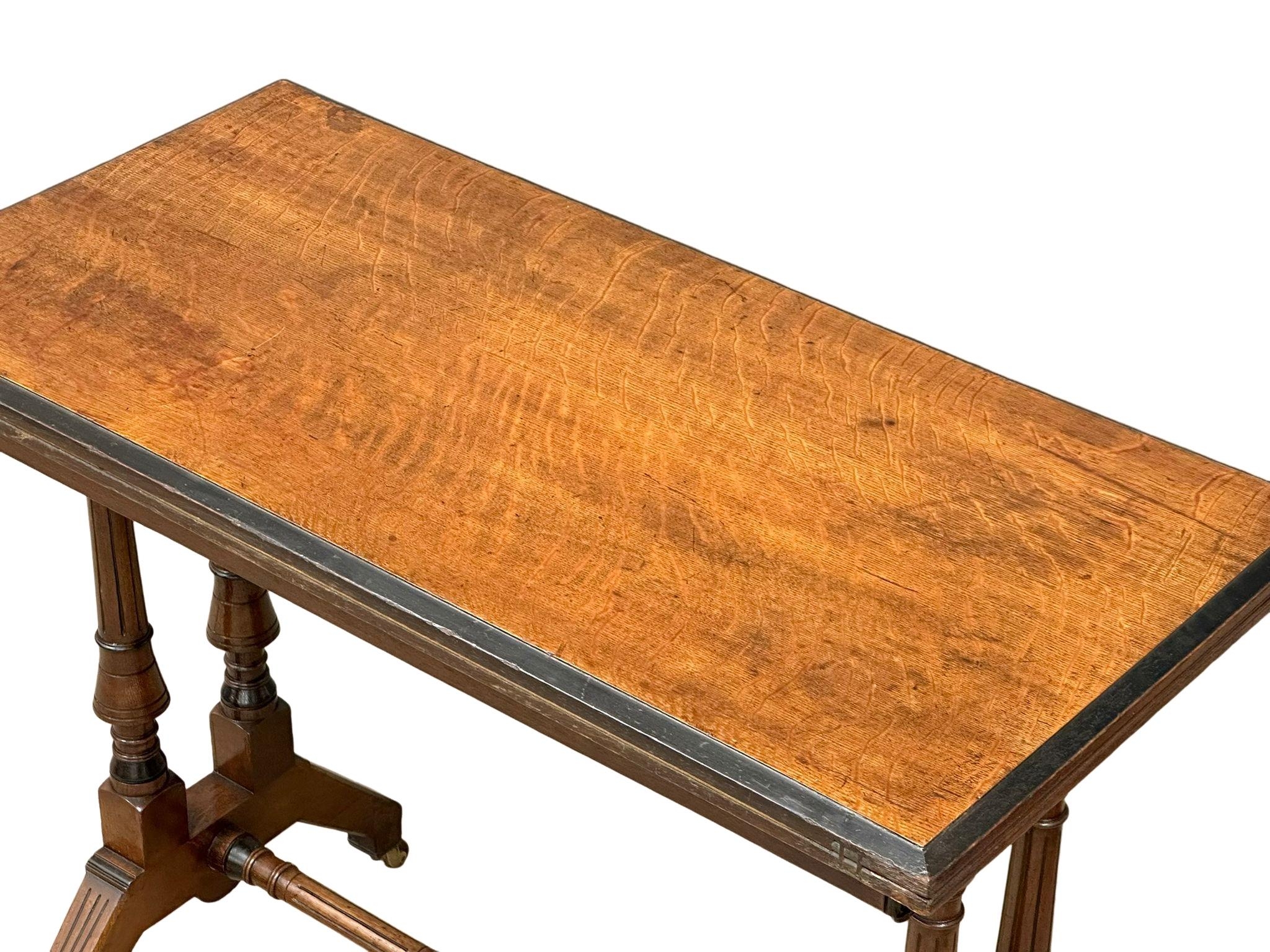 A Late Victorian oak turnover games table. 91x46x74cm - Image 5 of 5