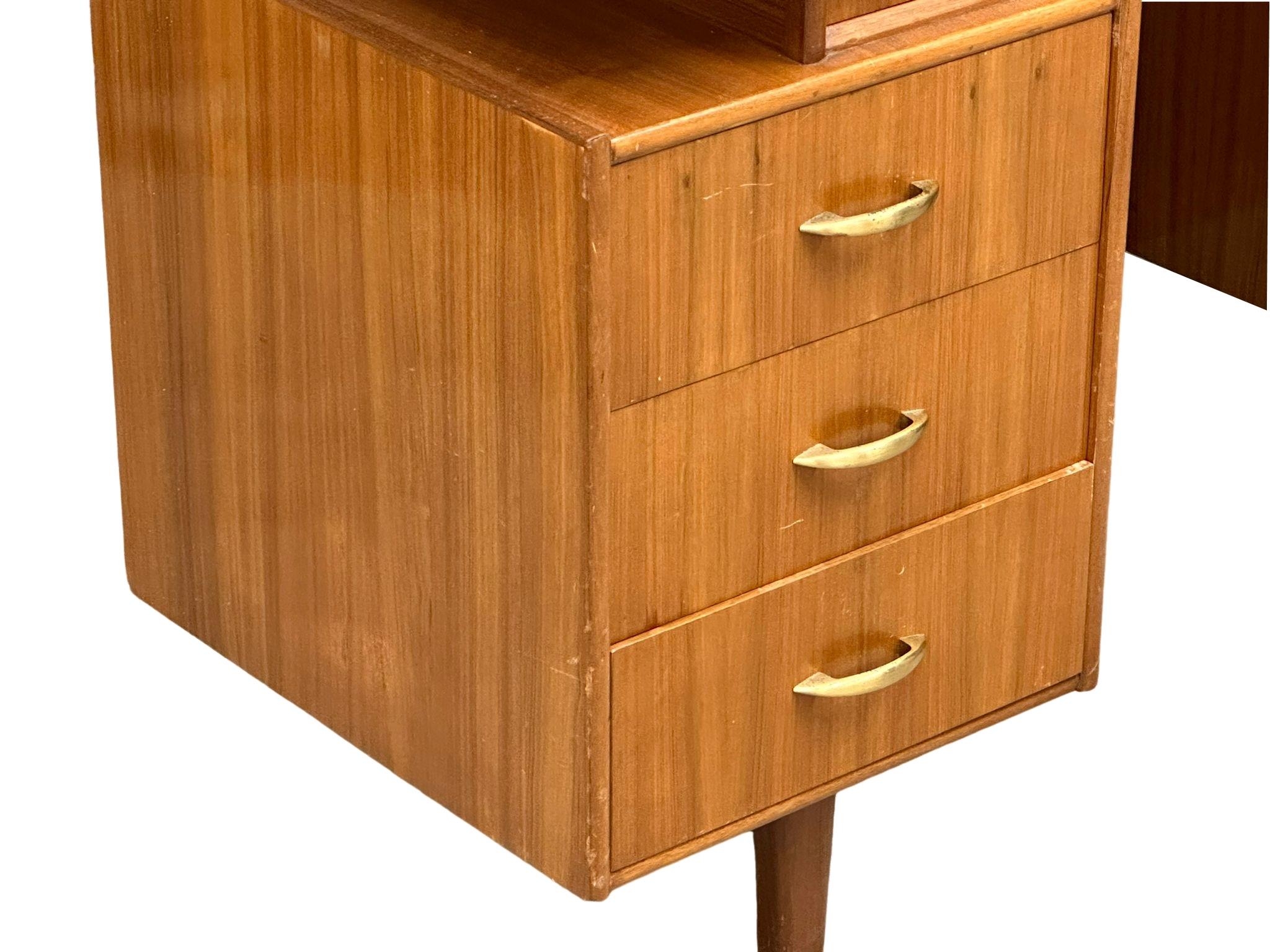 A Mid Century walnut desk/dressing table, 131cm x 49cm x 74.5cm - Image 3 of 5