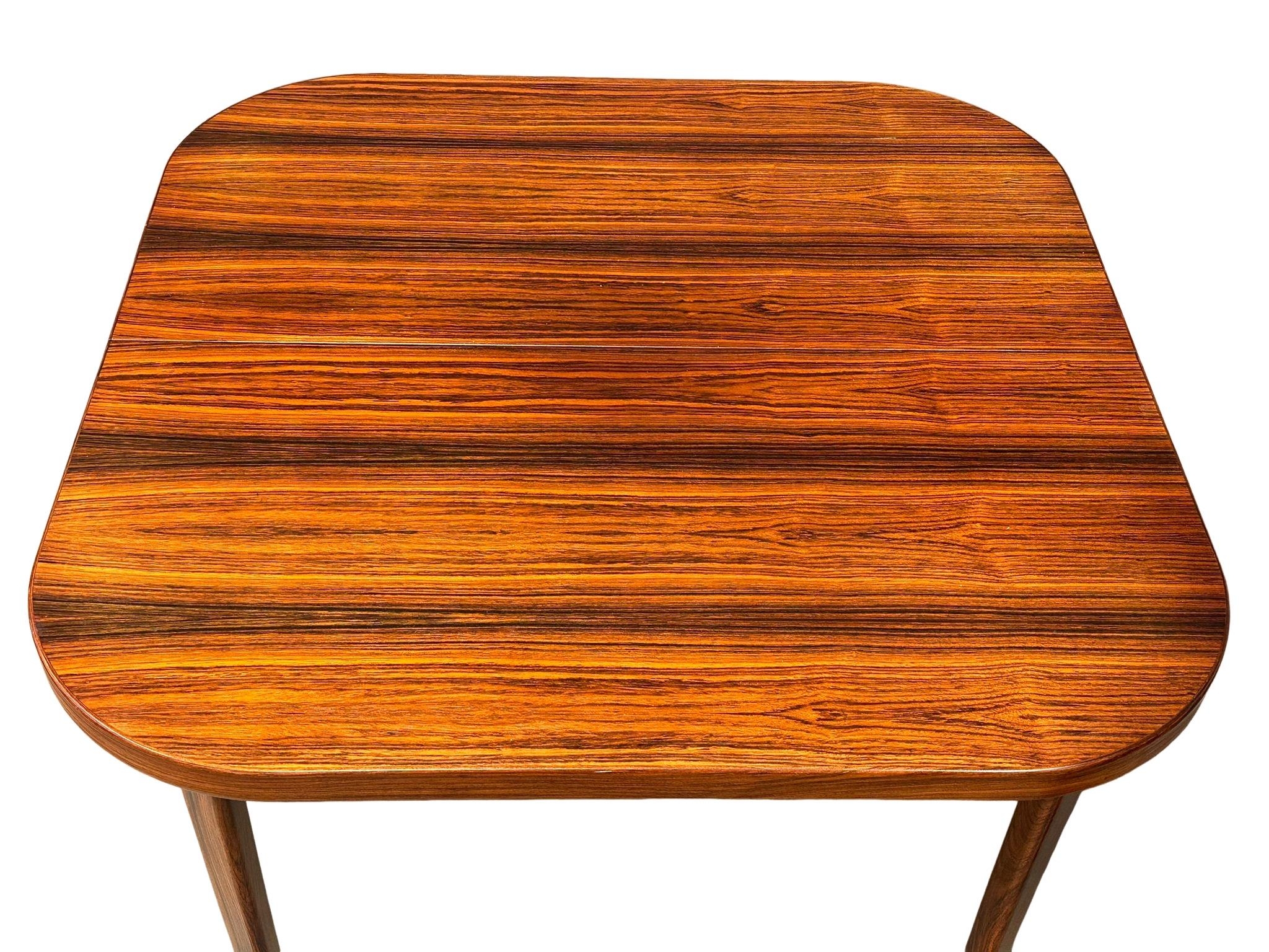 A Danish Mid Century rosewood extending dining table and 4 chairs. Closed 101x101x73cm. 1 leaf - Image 4 of 12