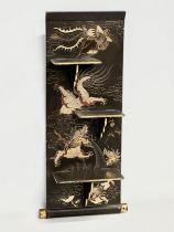 An Early 20th Century Japanese hand painted lacquered wall shelf. Circa 1900-1920. 25x56cm