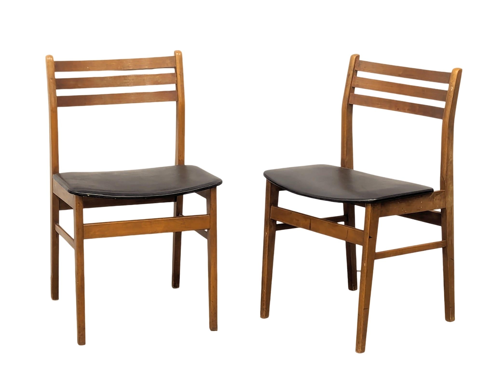 A mid century teak table and 6 chairs, 168cm x 89cm x 75cm. Extended 211cm x 89cm x 75cm - Image 4 of 17