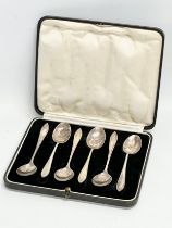 Silver spoons in case. Birmingham 1931. 62.54 grams.