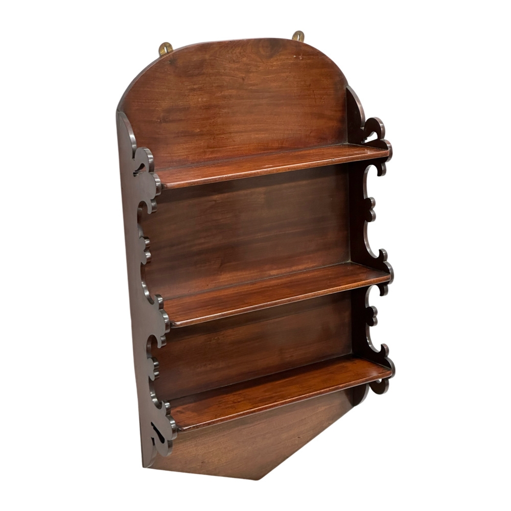 A 19th Century Victorian mahogany wall mounted shelving unit. 56x17x96.5cm