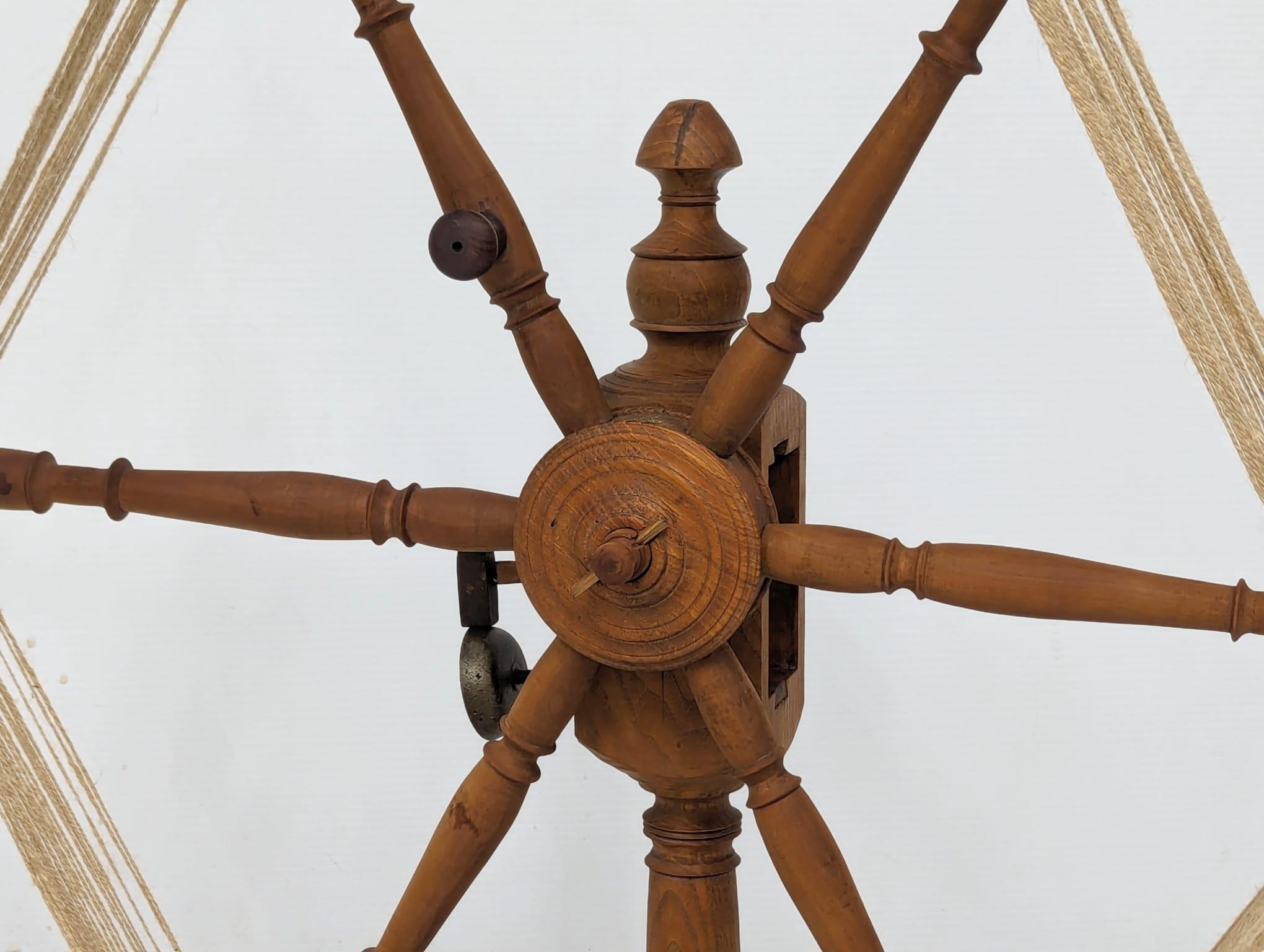 An Early 20th Century skein winder and a floor standing distaff. 69x79cm - Image 2 of 5